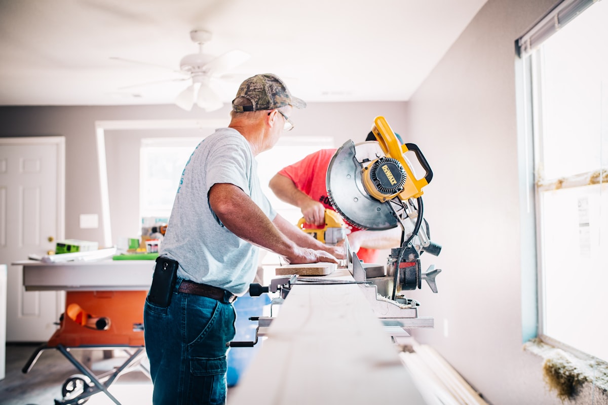 Contractor using a miter saw during a home renovation