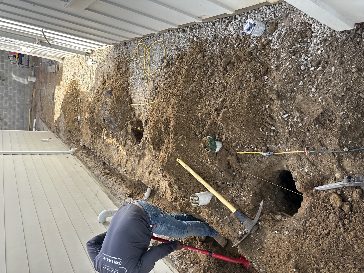 Sam from Ecosystem Landscaping installing irrigation on a Coronado job site - the operators we build the system for